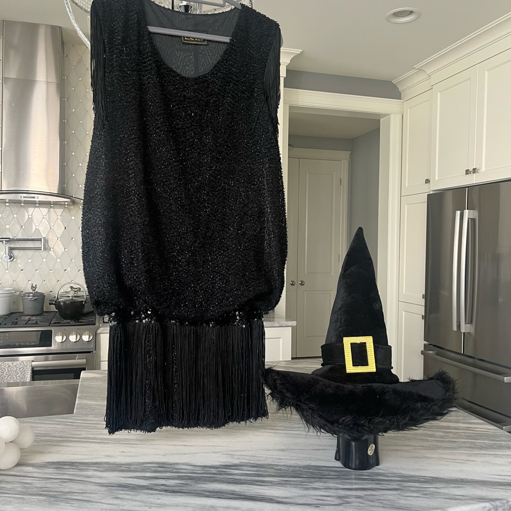 Glamorous black witch for Halloween size medium